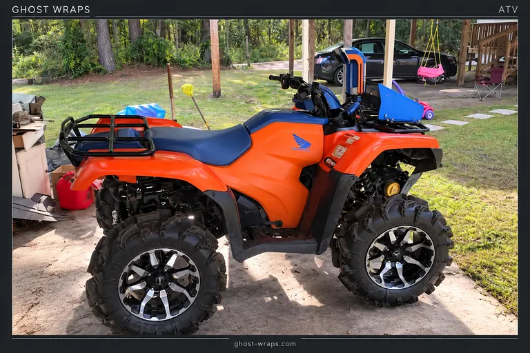 Orange Honda ATV with a blue seat and accents in the Ghost Wraps photo collection