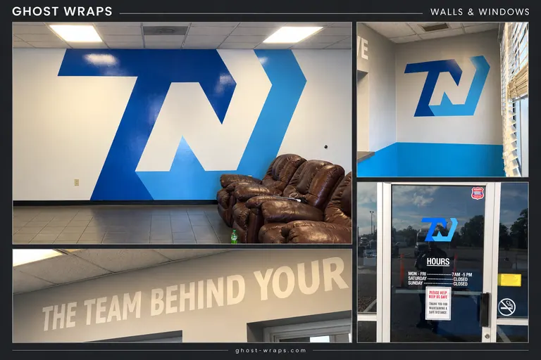Large blue wall logo, smaller office logo, wall lettering and matching glass-door graphics